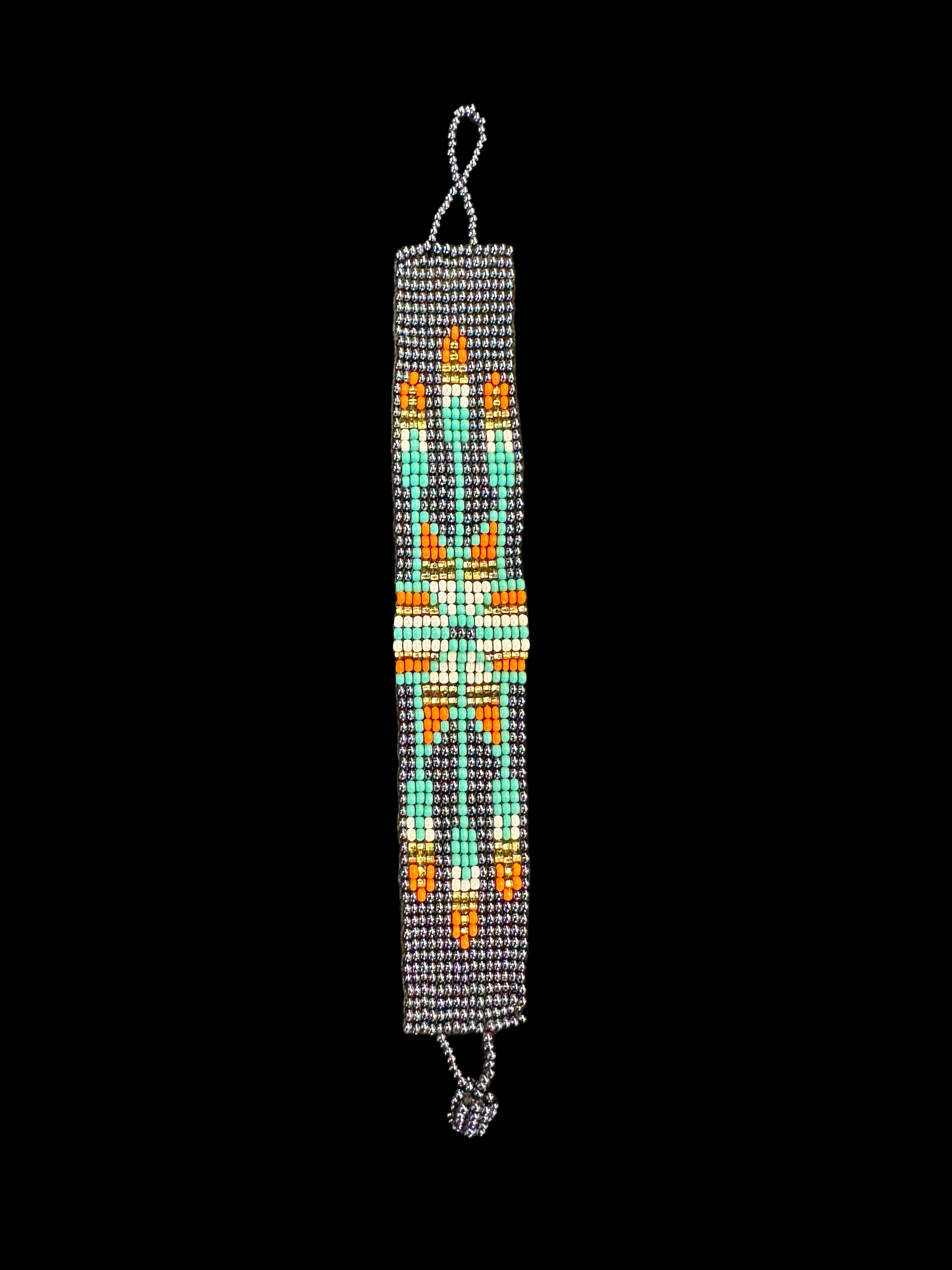 This beautiful hand-made Guatemalan accessory is a great addition to any jewelry collection! The bracelet boasts fun, vibrant colors inspired by the vibrant palette of the native culture. It's sure to turn heads with its unique design and beautiful hues. Add a bit of fun and excitement to your look with the Arrow Maya Design Bracelet!