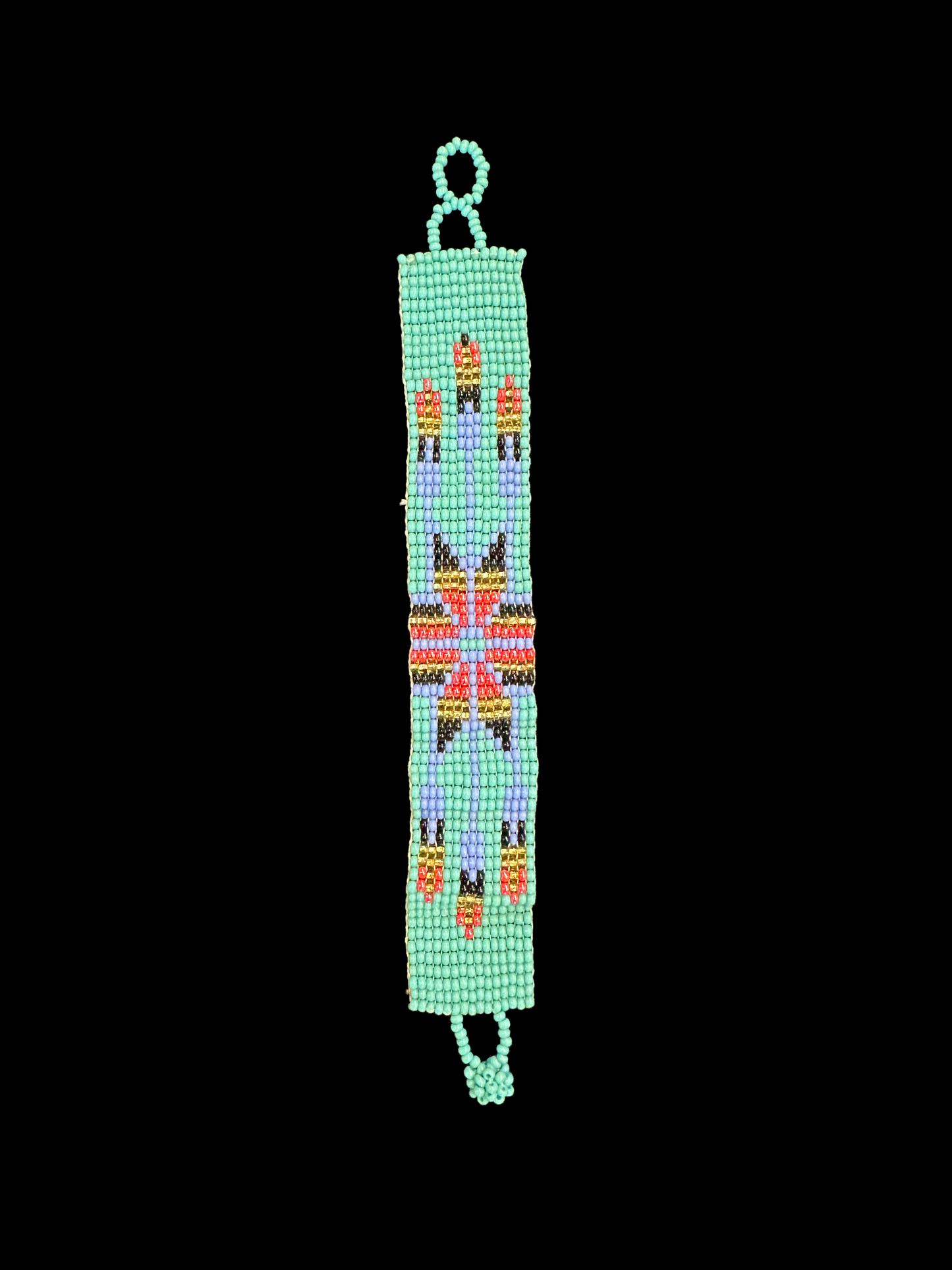 This beautiful hand-made Guatemalan accessory is a great addition to any jewelry collection! The bracelet boasts fun, vibrant colors inspired by the vibrant palette of the native culture. It's sure to turn heads with its unique design and beautiful hues. Add a bit of fun and excitement to your look with the Arrow Maya Design Bracelet!