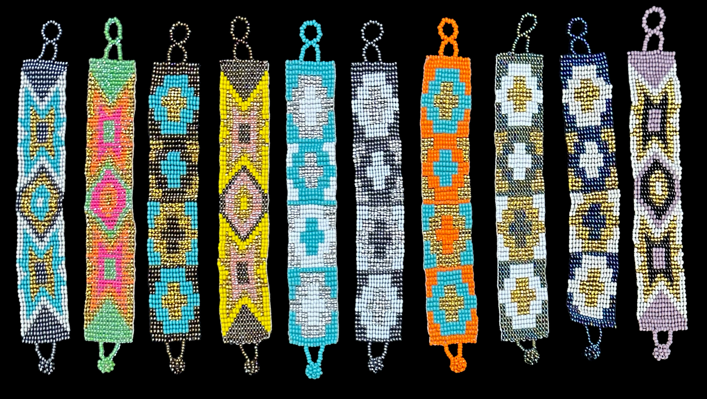 This beautiful hand-made Guatemalan accessory is a great addition to any jewelry collection! The bracelet boasts fun, vibrant colors inspired by the vibrant palette of the native culture. It's sure to turn heads with its unique design and beautiful hues. Add a bit of fun and excitement to your look with the Cross Maya Design Bracelet!