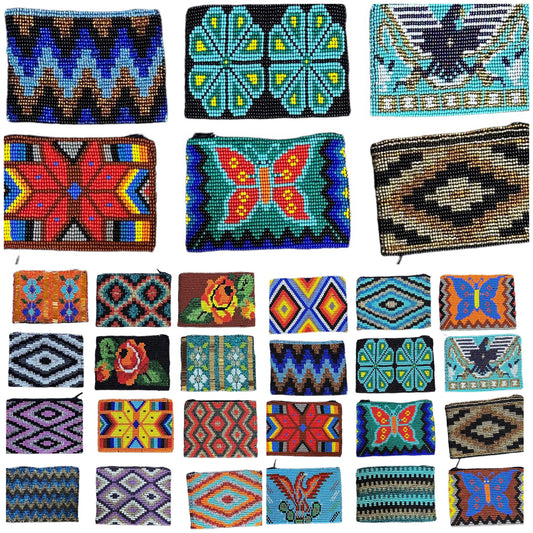 These Guatemalan Hand Beaded Coin Purses are a handcrafted piece of art. Handmade with beads, each purse is lined with a silky nylon lining and closes with a zip-top closure. They are great for organizing items in your purse or bag, and hold credit cards, IDs, metro passes, and change. Perfect for everyday use.