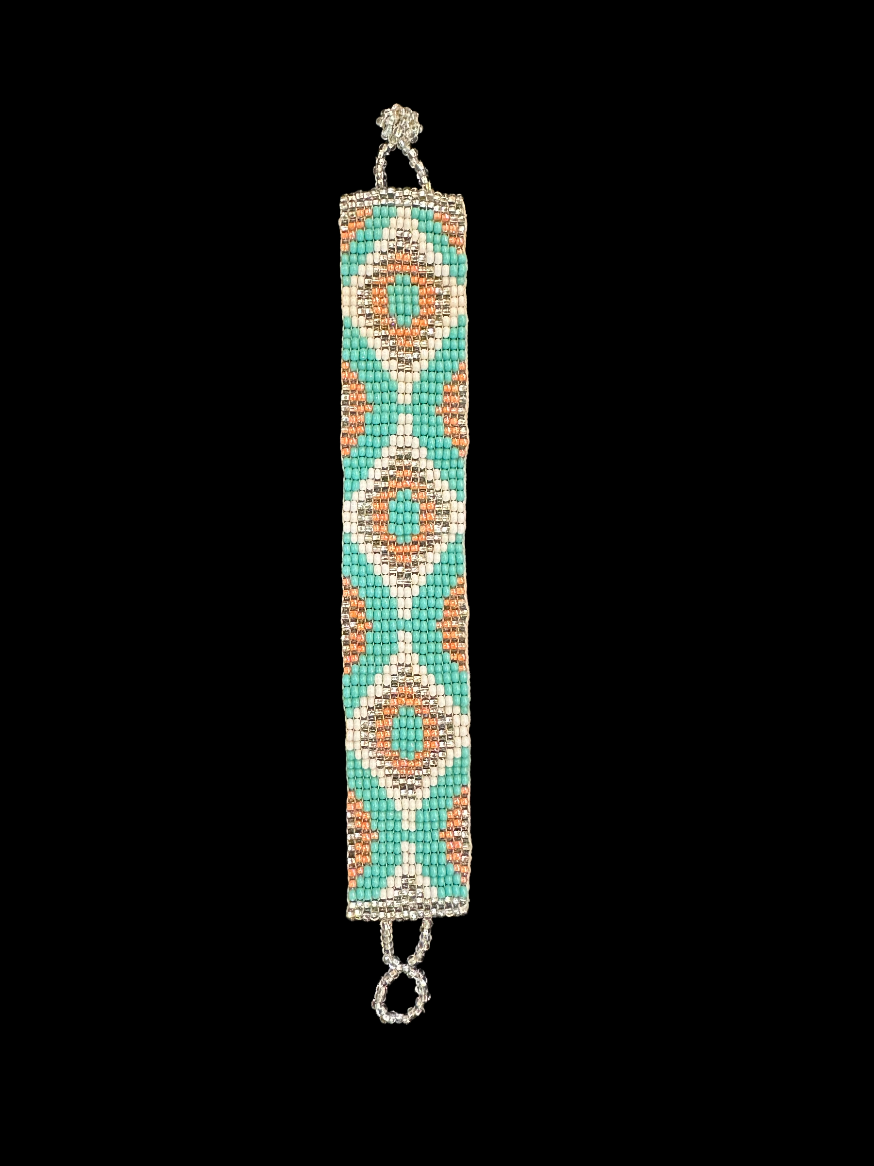 This beautiful hand-made Guatemalan accessory is a great addition to any jewelry collection! The bracelet boasts fun, vibrant colors inspired by the vibrant palette of the native culture. It's sure to turn heads with its unique design and beautiful hues. Add a bit of fun and excitement to your look with the Big Diamond Maya Design Bracelet!