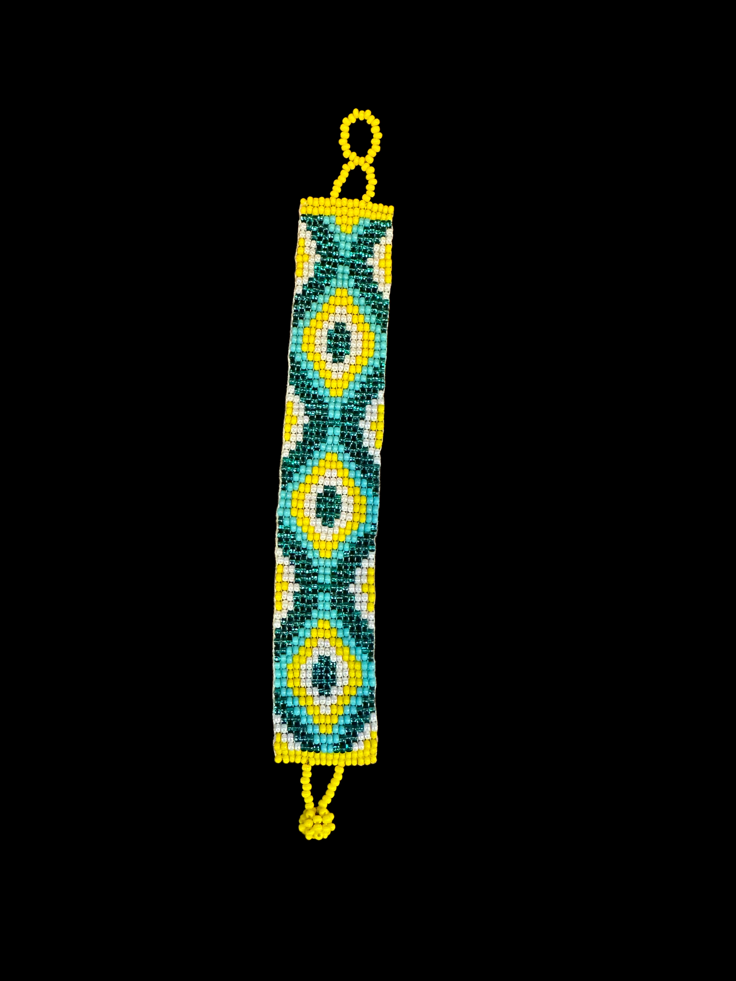 This beautiful hand-made Guatemalan accessory is a great addition to any jewelry collection! The bracelet boasts fun, vibrant colors inspired by the vibrant palette of the native culture. It's sure to turn heads with its unique design and beautiful hues. Add a bit of fun and excitement to your look with the Big Diamond Maya Design Bracelet!