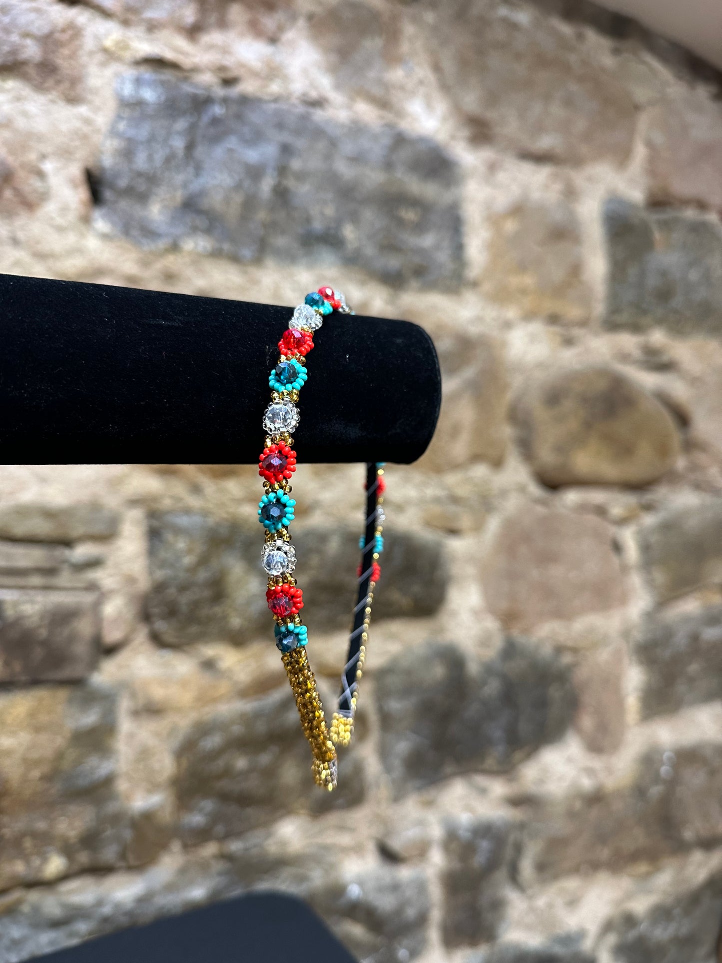 Add a burst of color to your Child's day with these cheerful floral design beaded headbands! All of these headbands are hand made with colorful beads and intricate detail, making them a perfect addition to your child's wardrobe. Ideal for children ages 5 and up, these beaded headbands will become your child's favorite accessory, adding a unique and fun flair to their look!