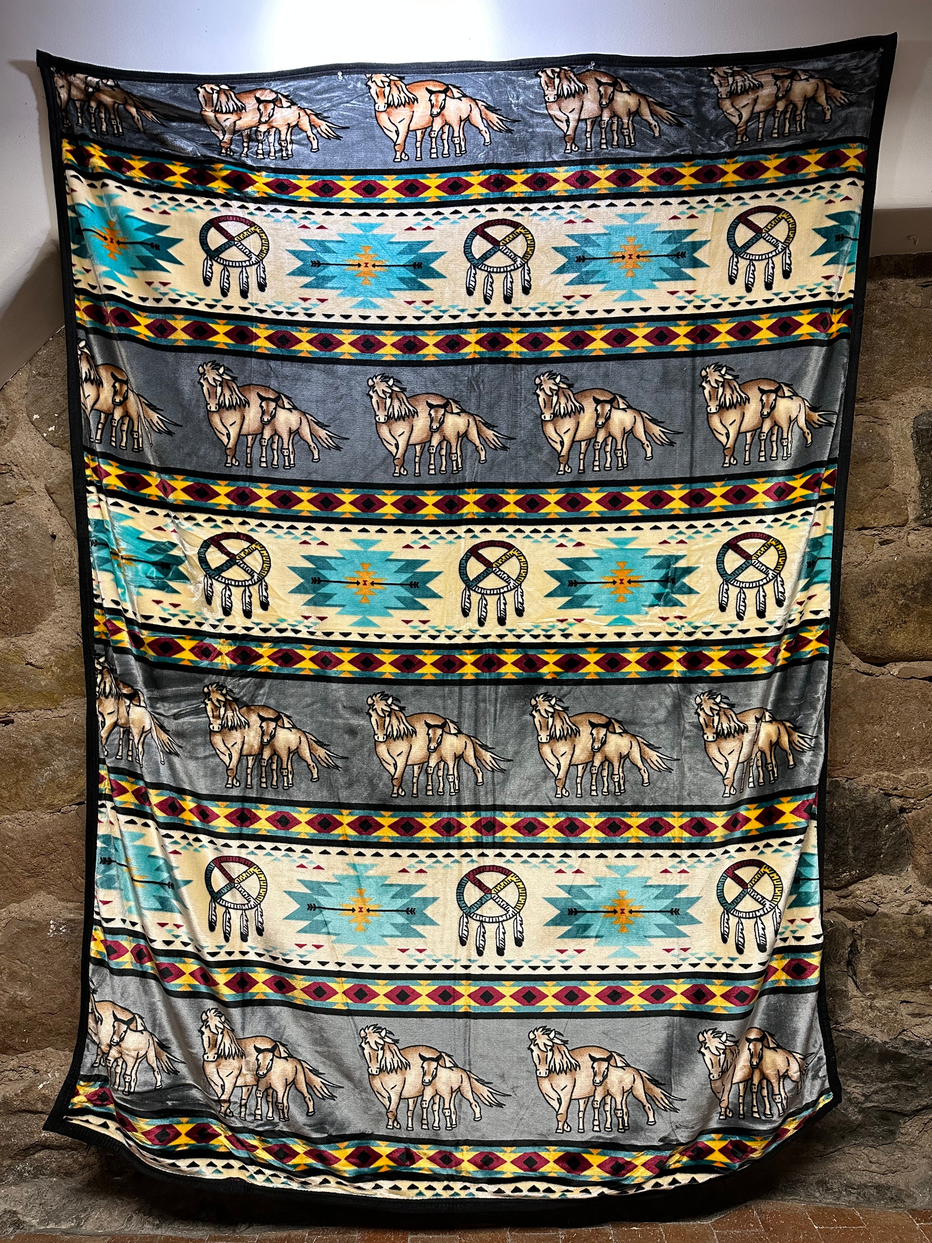 The Horse Native Design Blanket – a perfect combination of softness, comfort and Native design! Wrap yourself in our cuddly blanket and feel the comfort that radiates from its unique Horse Design. With its beautiful Native design, this blanket is perfect for your bedroom, sofa and anywhere you'd like to be comforted and add a bit of style. Enjoy the Native design and its cuddly softness – a perfect addition for your home and snuggling moments.