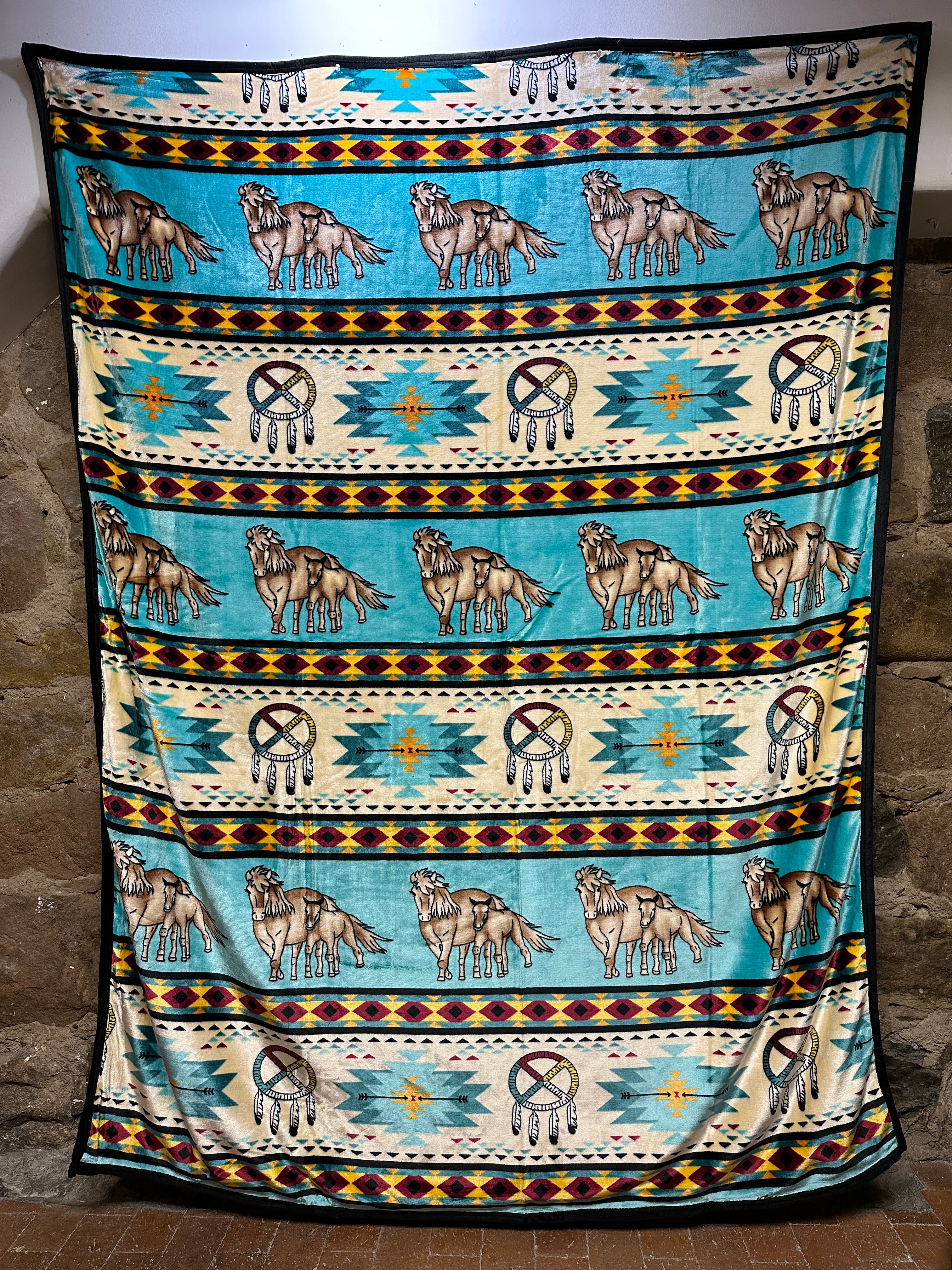 The Horse Native Design Blanket – a perfect combination of softness, comfort and Native design! Wrap yourself in our cuddly blanket and feel the comfort that radiates from its unique Horse Design. With its beautiful Native design, this blanket is perfect for your bedroom, sofa and anywhere you'd like to be comforted and add a bit of style. Enjoy the Native design and its cuddly softness – a perfect addition for your home and snuggling moments.