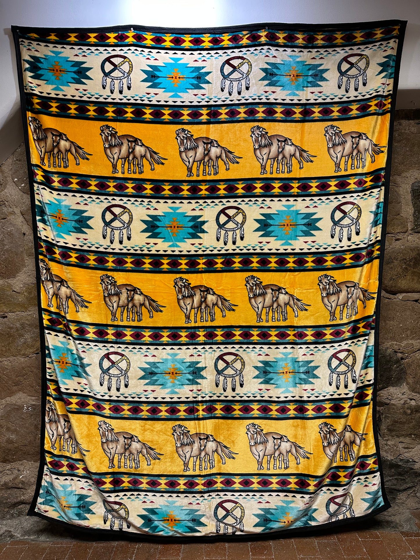 Introducing the Horse Native Design Blanket – a perfect combination of softness, comfort and Native design! Wrap yourself in our cuddly blanket and feel the comfort that radiates from its unique Horse Design. With its beautiful Native design, this blanket is perfect for your bedroom, sofa and anywhere you'd like to be comforted and add a bit of style. Enjoy the Native design and its cuddly softness – a perfect addition for your home and snuggling moments.