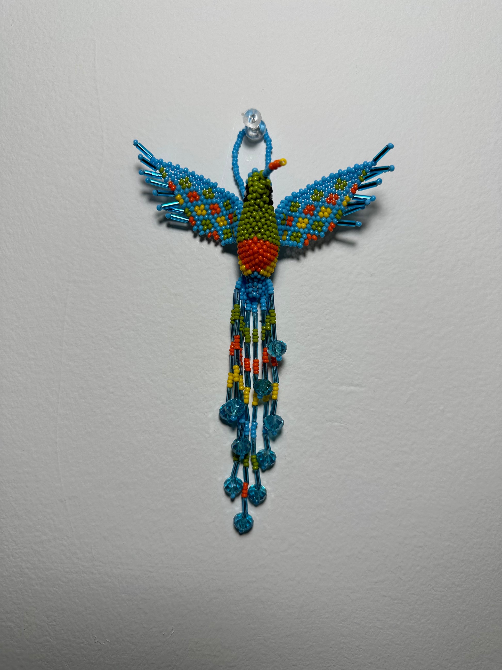 The Humming Bird Beaded Key Chain is something extra special that you won't find anywhere else. Hand Made in Guatemala and decorated with beautiful, multicolored beads, this keychain is unlike any other. Each piece is completely unique and comes in a variety of different colors, ensuring that you can find the perfect accessory to match your style.