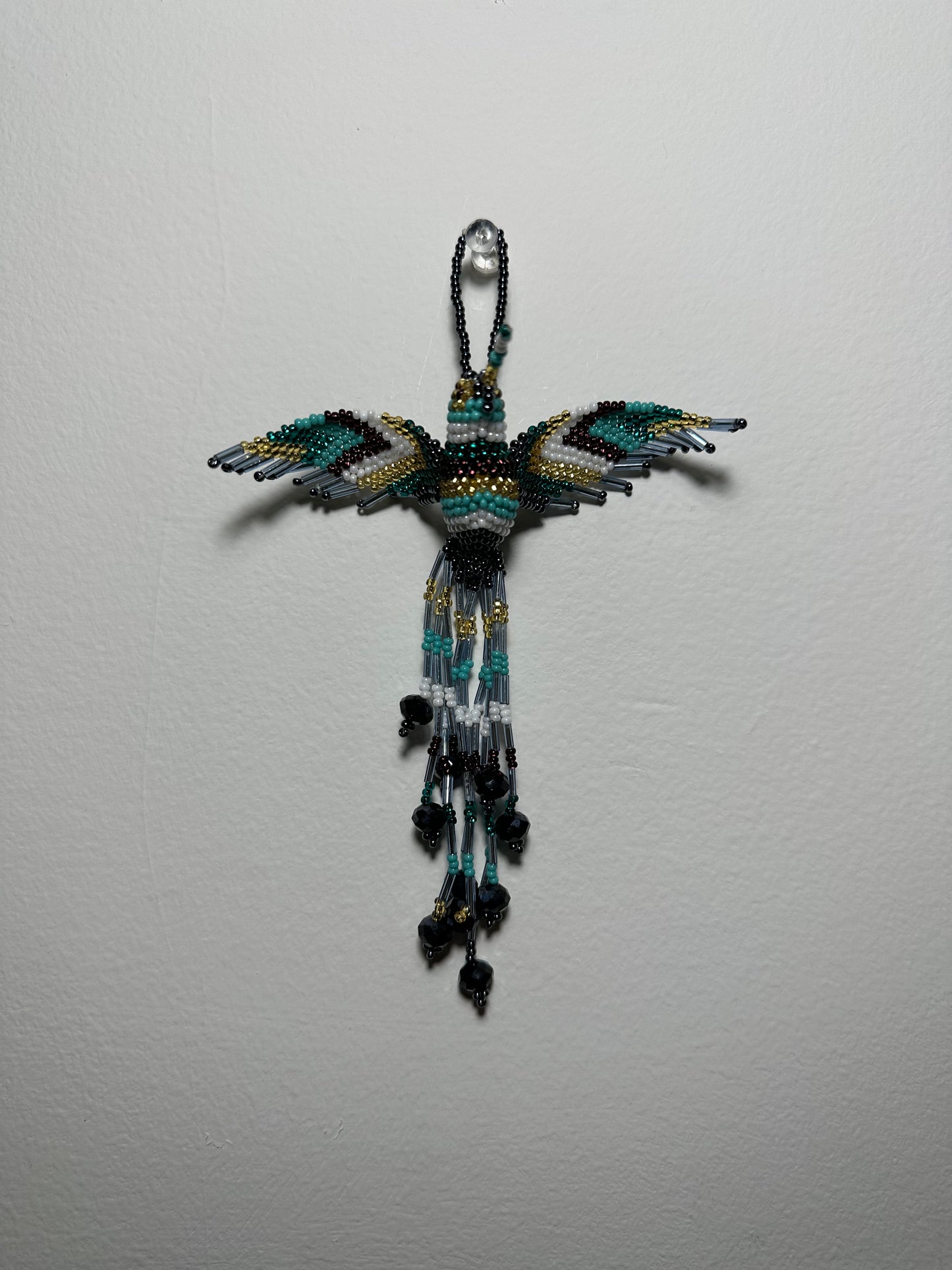 The Humming Bird Beaded Key Chain is something extra special that you won't find anywhere else. Hand Made in Guatemala and decorated with beautiful, multicolored beads, this keychain is unlike any other. Each piece is completely unique and comes in a variety of different colors, ensuring that you can find the perfect accessory to match your style.