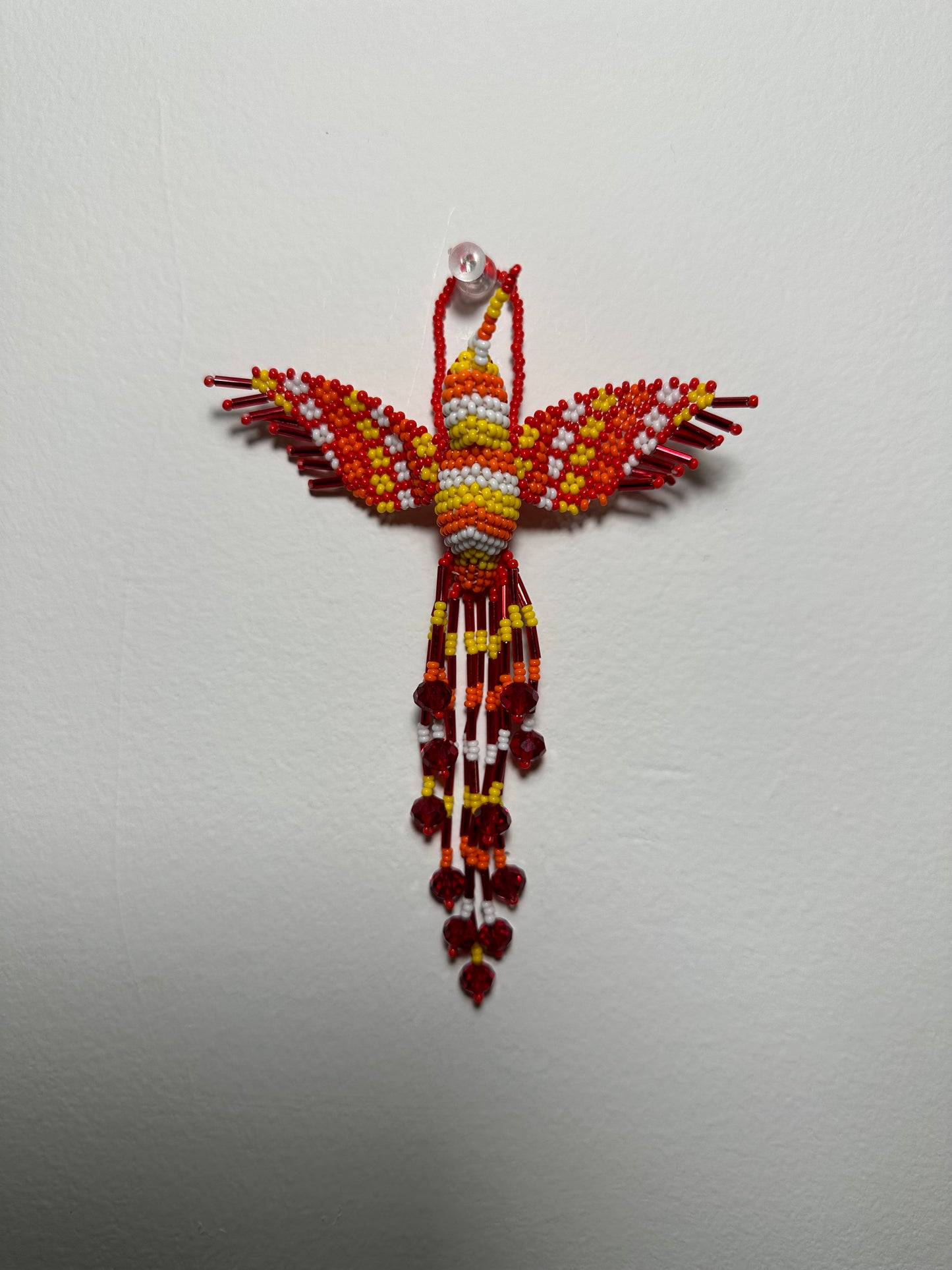 The Humming Bird Beaded Key Chain is something extra special that you won't find anywhere else. Hand Made in Guatemala and decorated with beautiful, multicolored beads, this keychain is unlike any other. Each piece is completely unique and comes in a variety of different colors, ensuring that you can find the perfect accessory to match your style.