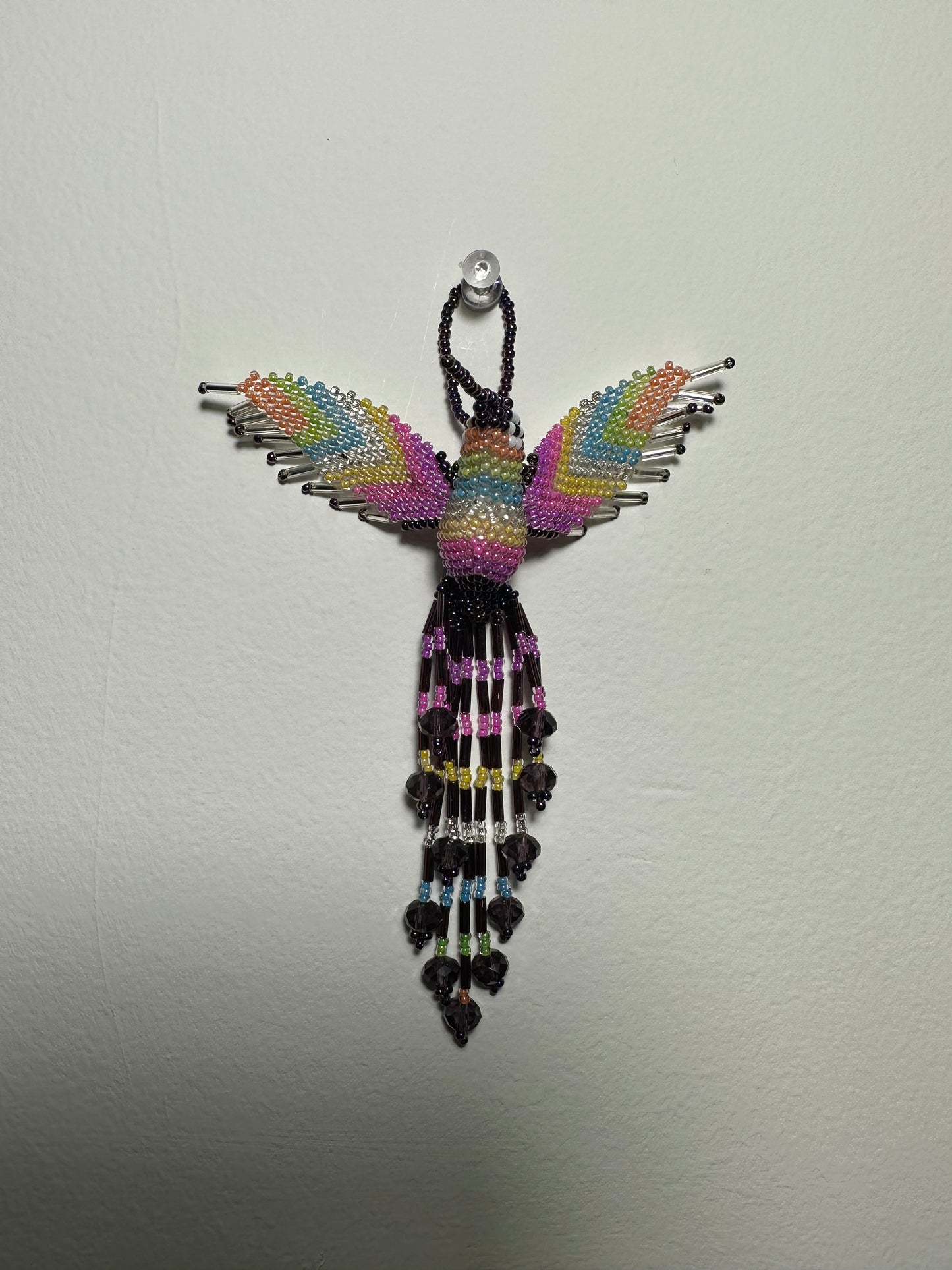 The Humming Bird Beaded Key Chain is something extra special that you won't find anywhere else. Hand Made in Guatemala and decorated with beautiful, multicolored beads, this keychain is unlike any other. Each piece is completely unique and comes in a variety of different colors, ensuring that you can find the perfect accessory to match your style.