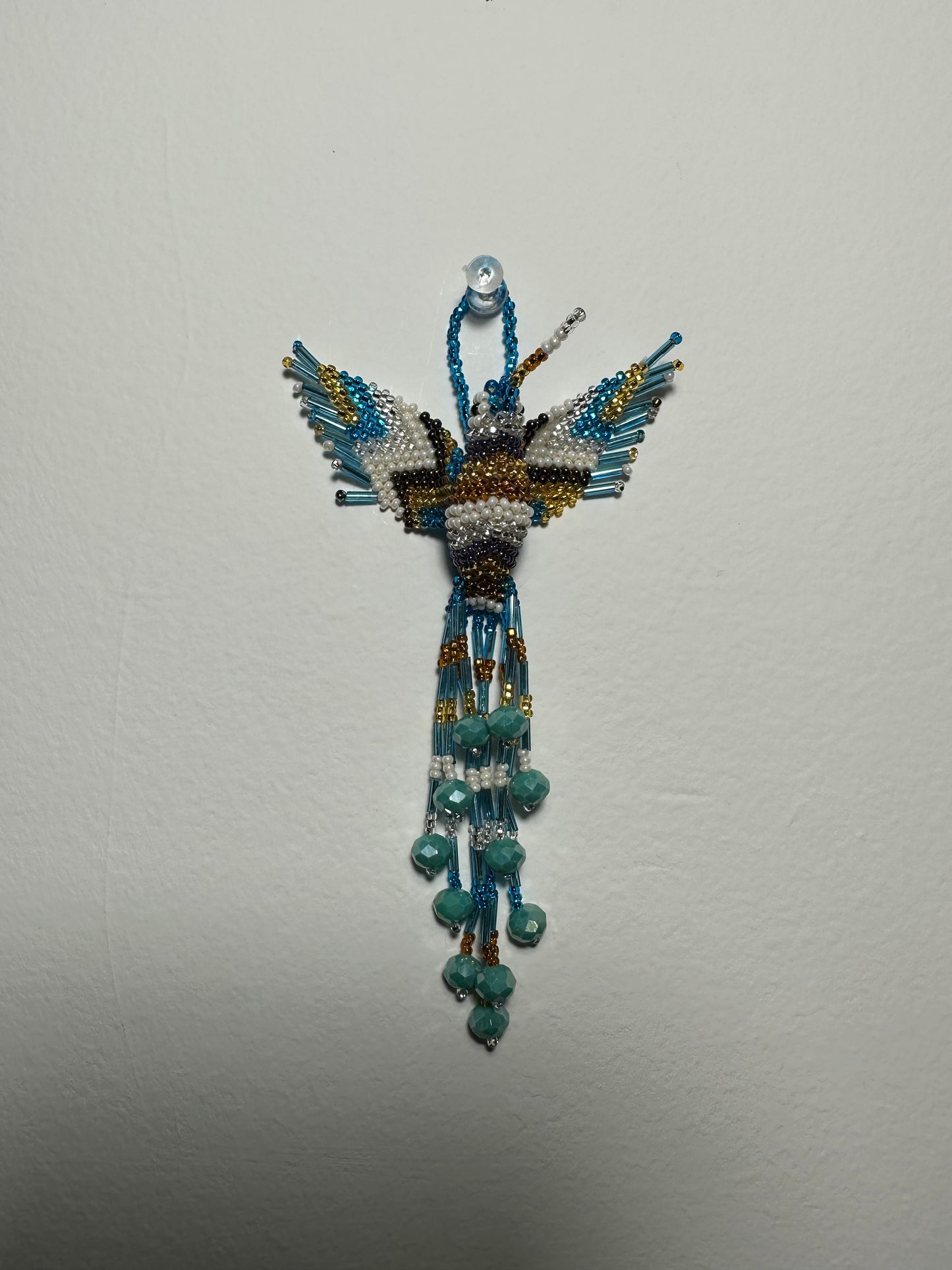 The Humming Bird Beaded Key Chain is something extra special that you won't find anywhere else. Hand Made in Guatemala and decorated with beautiful, multicolored beads, this keychain is unlike any other. Each piece is completely unique and comes in a variety of different colors, ensuring that you can find the perfect accessory to match your style.