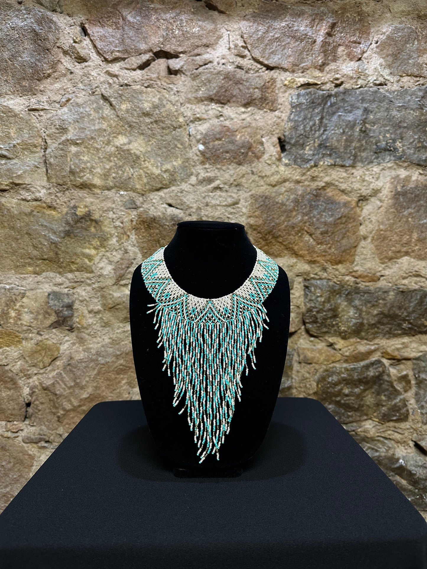 This beautiful Guatemalan-made Waterfall Beaded Necklace will add sparkle and color to any look! The craftsmanship is impeccable, with bright beads in a V-shaped waterfall design. Each piece is hand made with care and adds a unique beauty to any ensemble. Pull your look together with this stunning necklace!