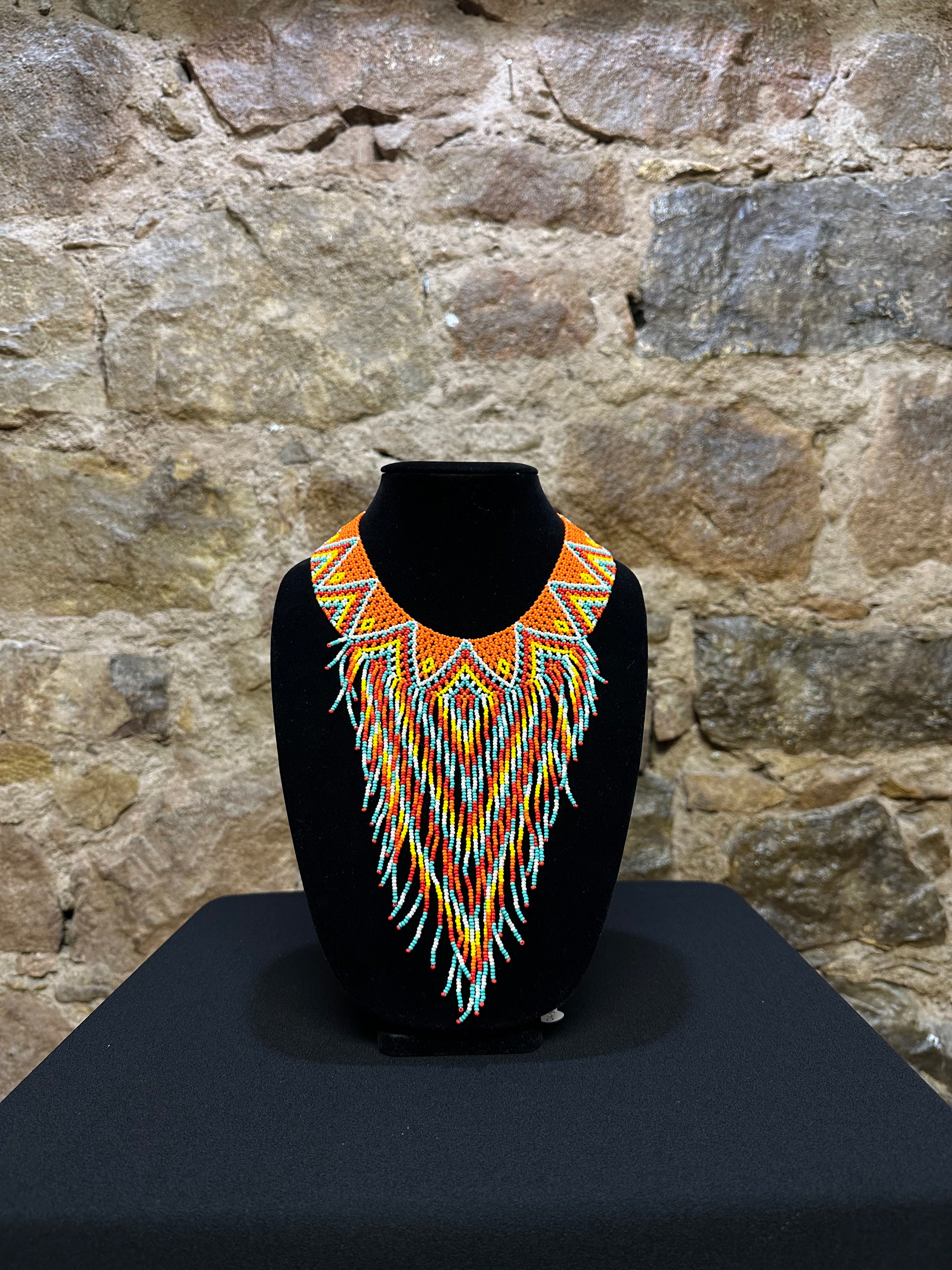 This beautiful Guatemalan-made Waterfall Beaded Necklace will add sparkle and color to any look! The craftsmanship is impeccable, with bright beads in a V-shaped waterfall design. Each piece is hand made with care and adds a unique beauty to any ensemble. Pull your look together with this stunning necklace!