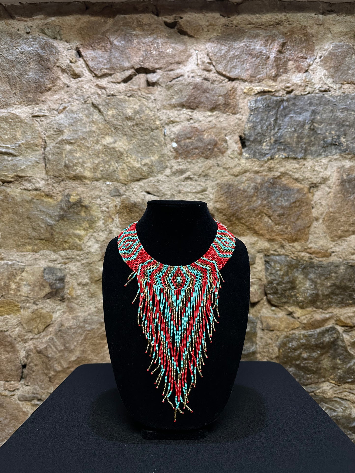 This beautiful Guatemalan-made Waterfall Beaded Necklace will add sparkle and color to any look! The craftsmanship is impeccable, with bright beads in a V-shaped waterfall design. Each piece is hand made with care and adds a unique beauty to any ensemble. Pull your look together with this stunning necklace!