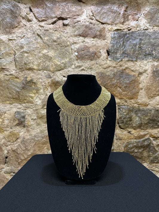 This beautiful Guatemalan-made Waterfall Beaded Necklace will add sparkle and color to any look! The craftsmanship is impeccable, with bright beads in a V-shaped waterfall design. Each piece is hand made with care and adds a unique beauty to any ensemble. Pull your look together with this stunning necklace!