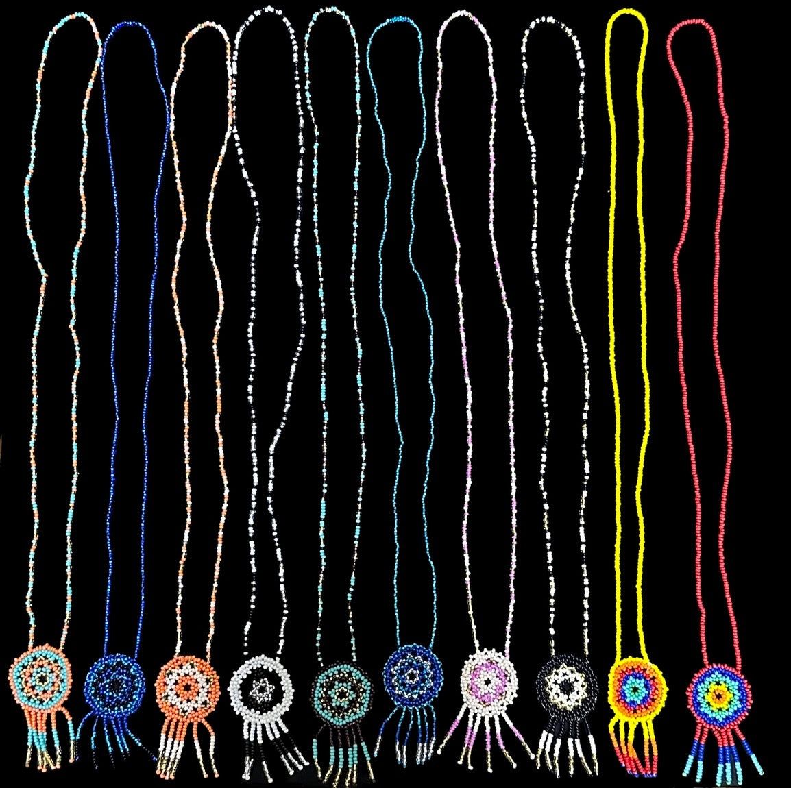 This handmade Dream Catcher Colorful Beaded Necklace is made with love and care to create a unique and stylish piece of jewelry for you. It is sure to add that special touch of color to any outfit. The small, colorful beads are carefully-woven together to form the dream catcher, creating a truly stunning piece of jewelry. Perfect for everyday wear, or as a special gift for any occasion.