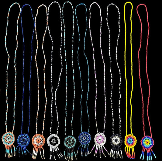 This handmade Dream Catcher Colorful Beaded Necklace is made with love and care to create a unique and stylish piece of jewelry for you. It is sure to add that special touch of color to any outfit. The small, colorful beads are carefully-woven together to form the dream catcher, creating a truly stunning piece of jewelry. Perfect for everyday wear, or as a special gift for any occasion.