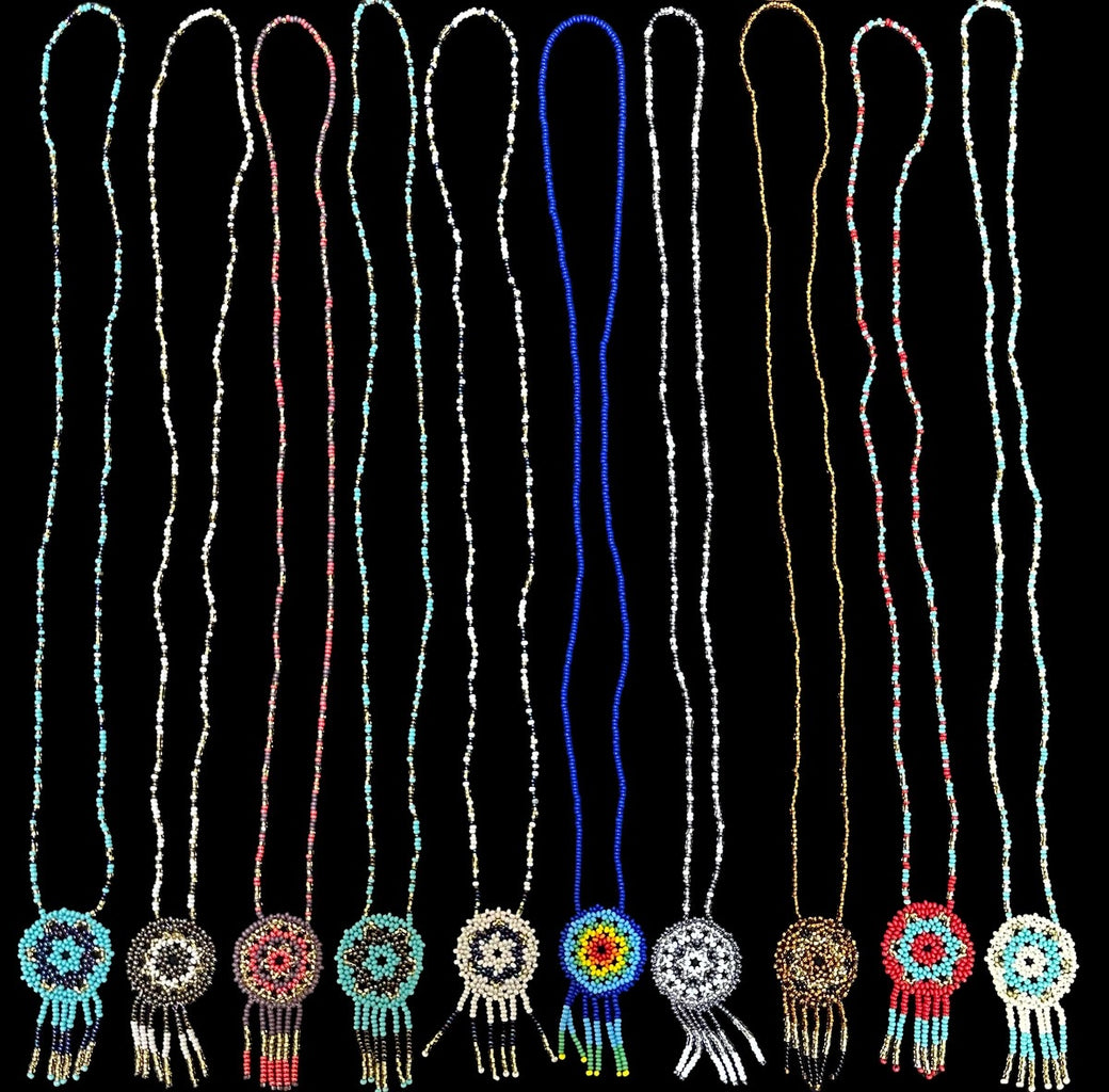 This handmade Dream Catcher Colorful Beaded Necklace is made with love and care to create a unique and stylish piece of jewelry for you. It is sure to add that special touch of color to any outfit. The small, colorful beads are carefully-woven together to form the dream catcher, creating a truly stunning piece of jewelry. Perfect for everyday wear, or as a special gift for any occasion.