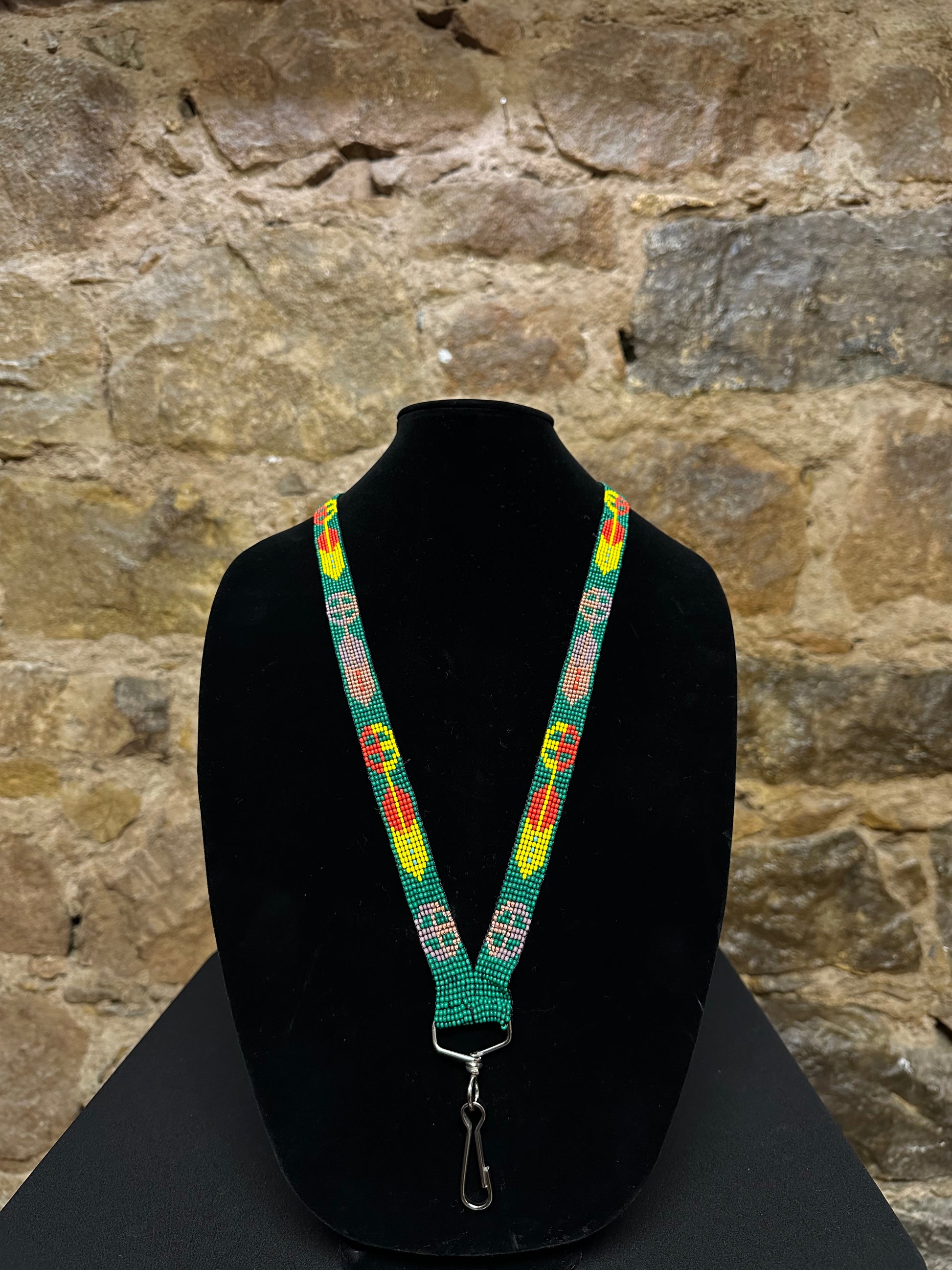 If you're looking for something to keep your keys close at hand, this Guatemalan Hand Made Beaded Key Holder Lanyard is just what you need! Hand made from beautiful Guatemalan beads and exquisitely crafted, this key holder lanyard will add a touch of style and sophistication to any outfit. Plus, it's comfortable to wear and lightweight so you won't even know it's there!