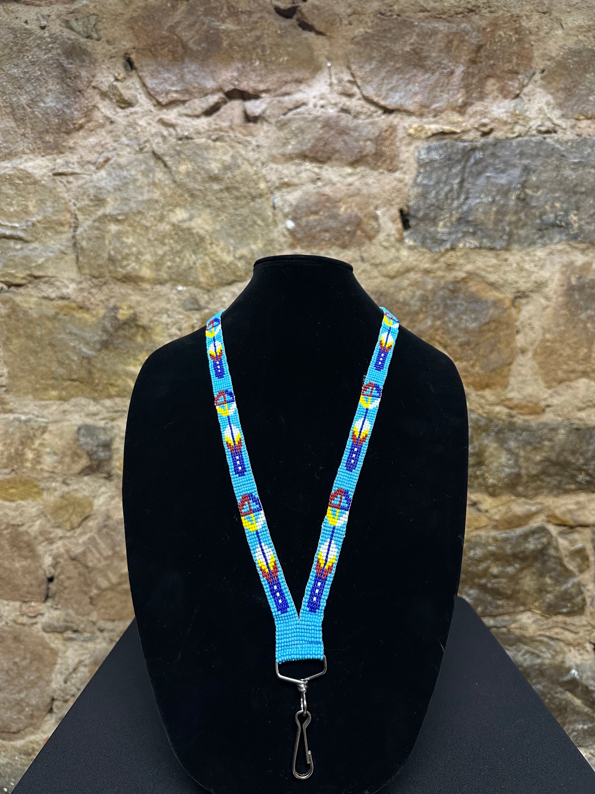 If you're looking for something to keep your keys close at hand, this Guatemalan Hand Made Beaded Key Holder Lanyard is just what you need! Hand made from beautiful Guatemalan beads and exquisitely crafted, this key holder lanyard will add a touch of style and sophistication to any outfit. Plus, it's comfortable to wear and lightweight so you won't even know it's there!