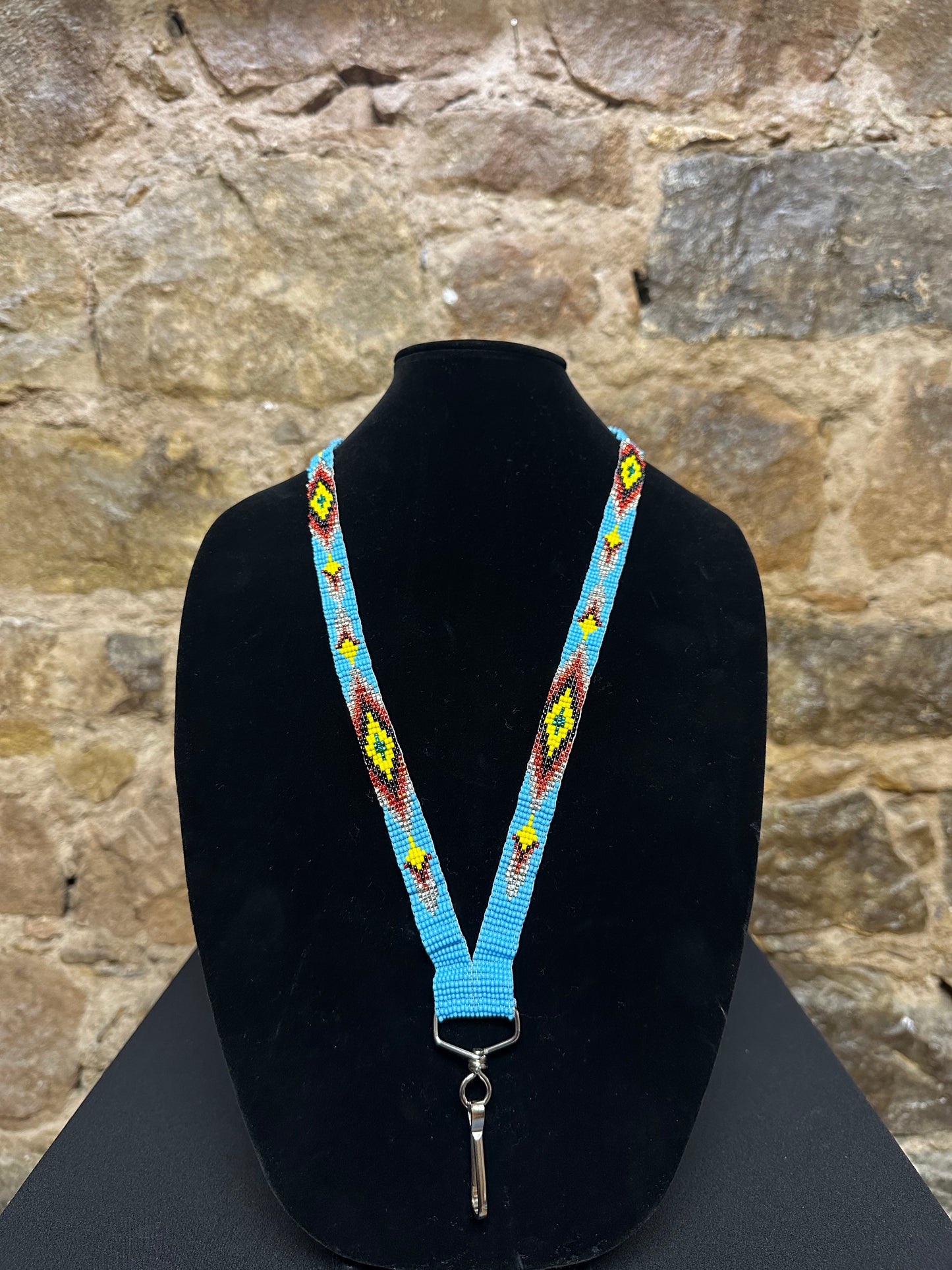 If you're looking for something to keep your keys close at hand, this Guatemalan Hand Made Beaded Key Holder Lanyard is just what you need! Hand made from beautiful Guatemalan beads and exquisitely crafted, this key holder lanyard will add a touch of style and sophistication to any outfit. Plus, it's comfortable to wear and lightweight so you won't even know it's there!