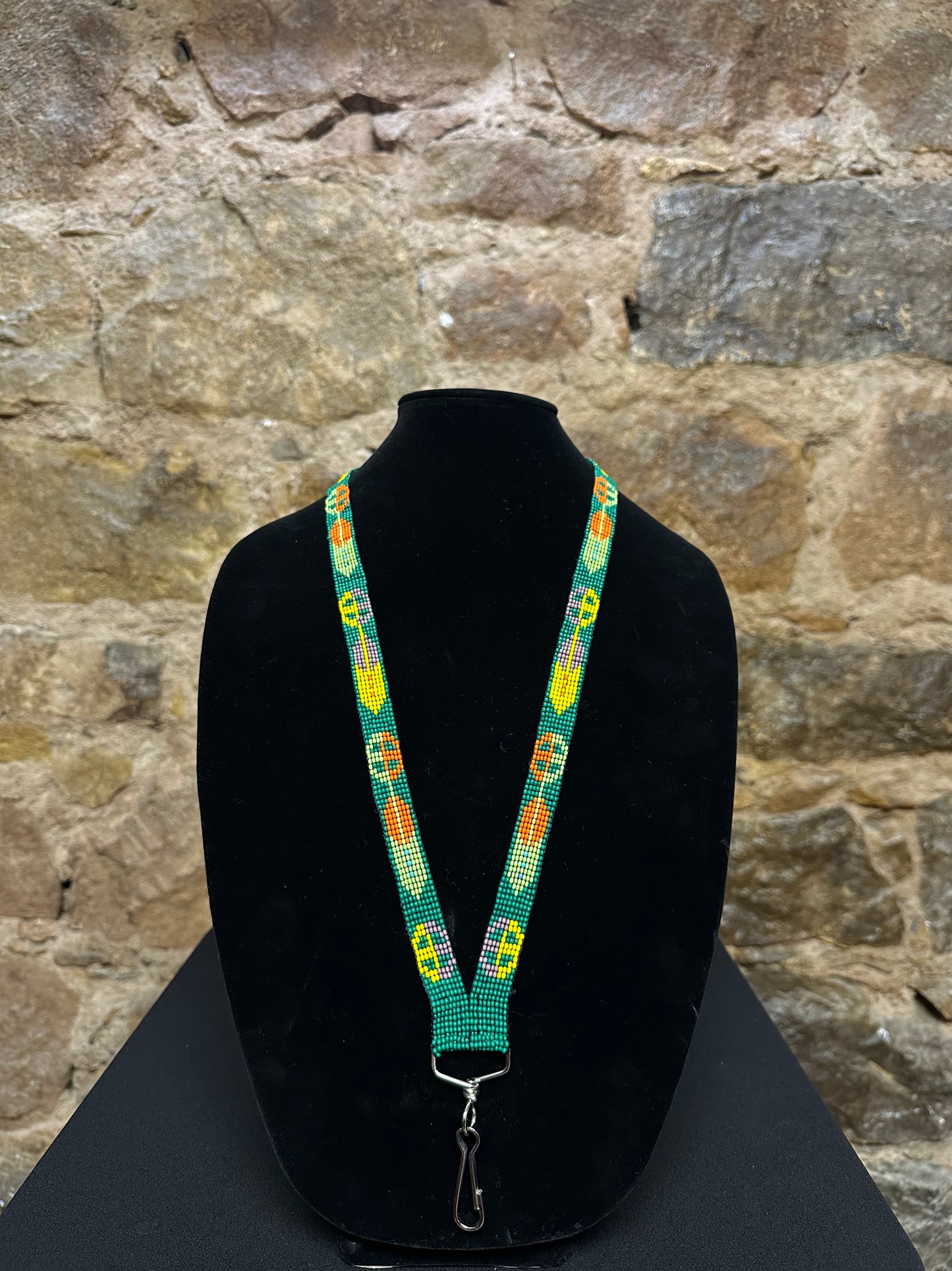 If you're looking for something to keep your keys close at hand, this Guatemalan Hand Made Beaded Key Holder Lanyard is just what you need! Hand made from beautiful Guatemalan beads and exquisitely crafted, this key holder lanyard will add a touch of style and sophistication to any outfit. Plus, it's comfortable to wear and lightweight so you won't even know it's there!