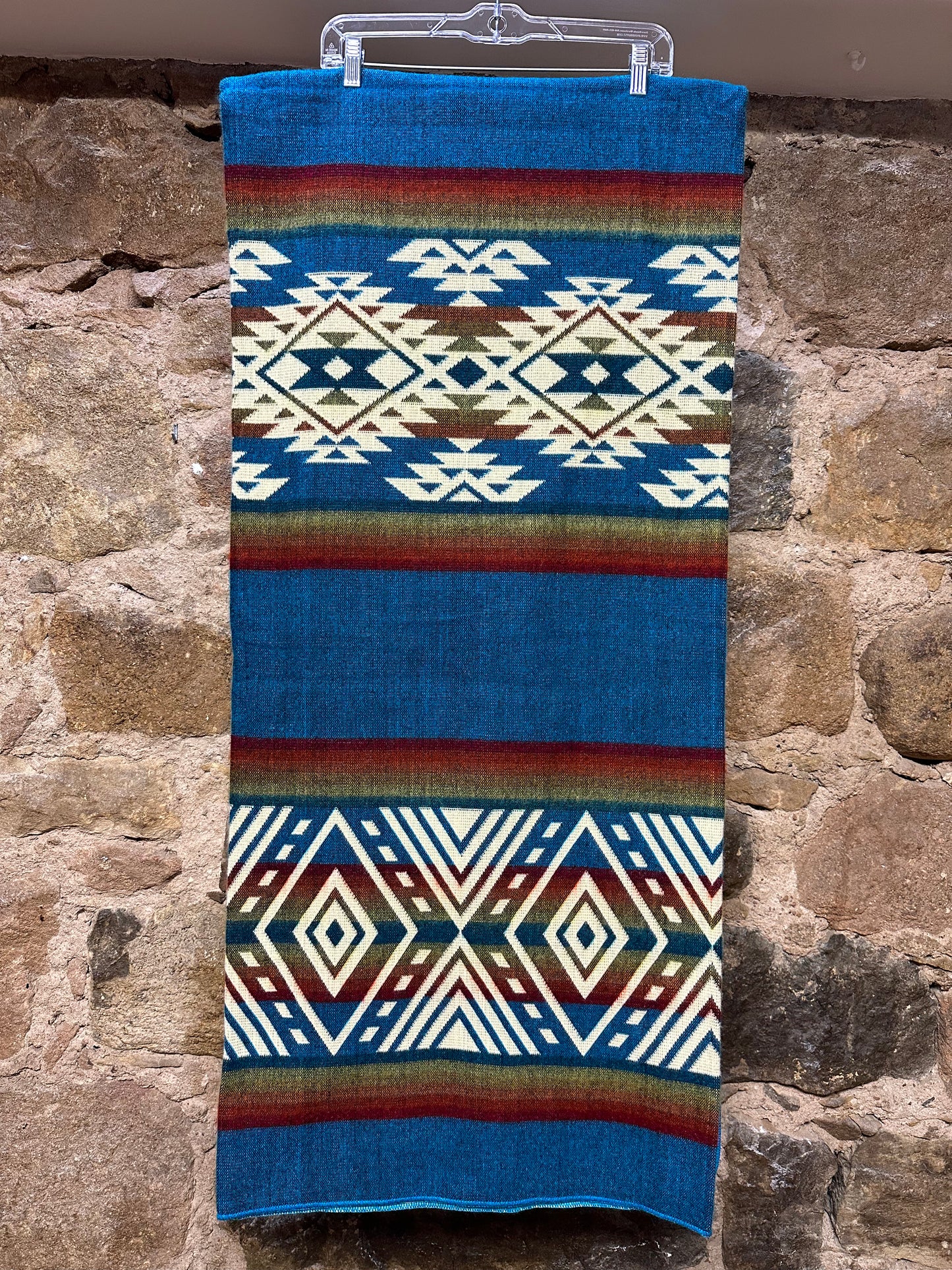 Kick back and cozy up with a blanket softer than anything you’ve ever experienced before. This vibrant, unique piece adds envy-worthy style to any room, while also being tough enough to withstand the wear and tear of constant use. Handmade by artisans in Ecuador. Reversible Color.