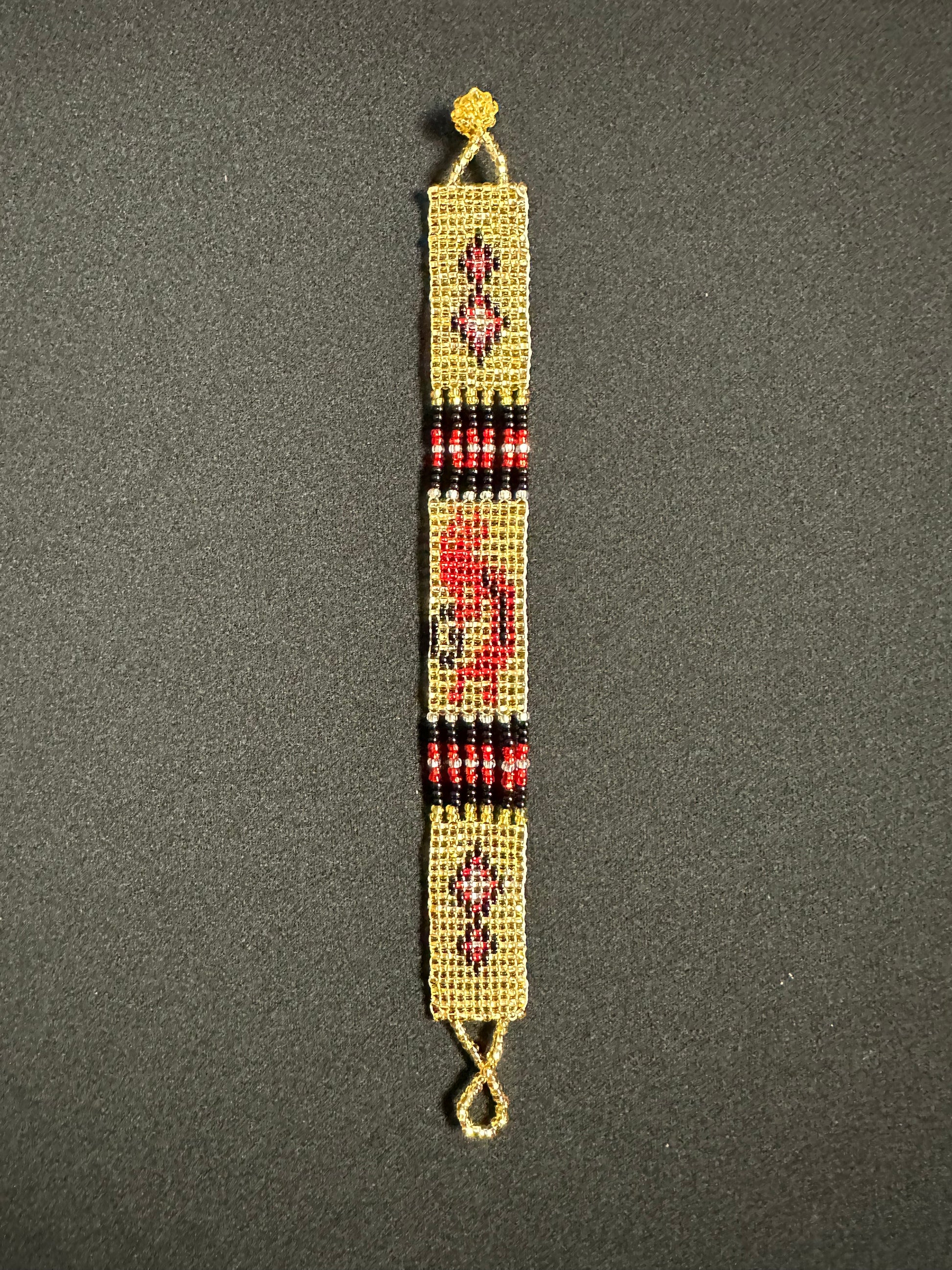 This beautiful hand-made Guatemalan accessory is a great addition to any jewelry collection! The bracelet boasts fun, vibrant colors inspired by the vibrant palette of the native culture. It's sure to turn heads with its unique design and beautiful hues. Add a bit of fun and excitement to your look with the Kokopelli Design Bracelet!