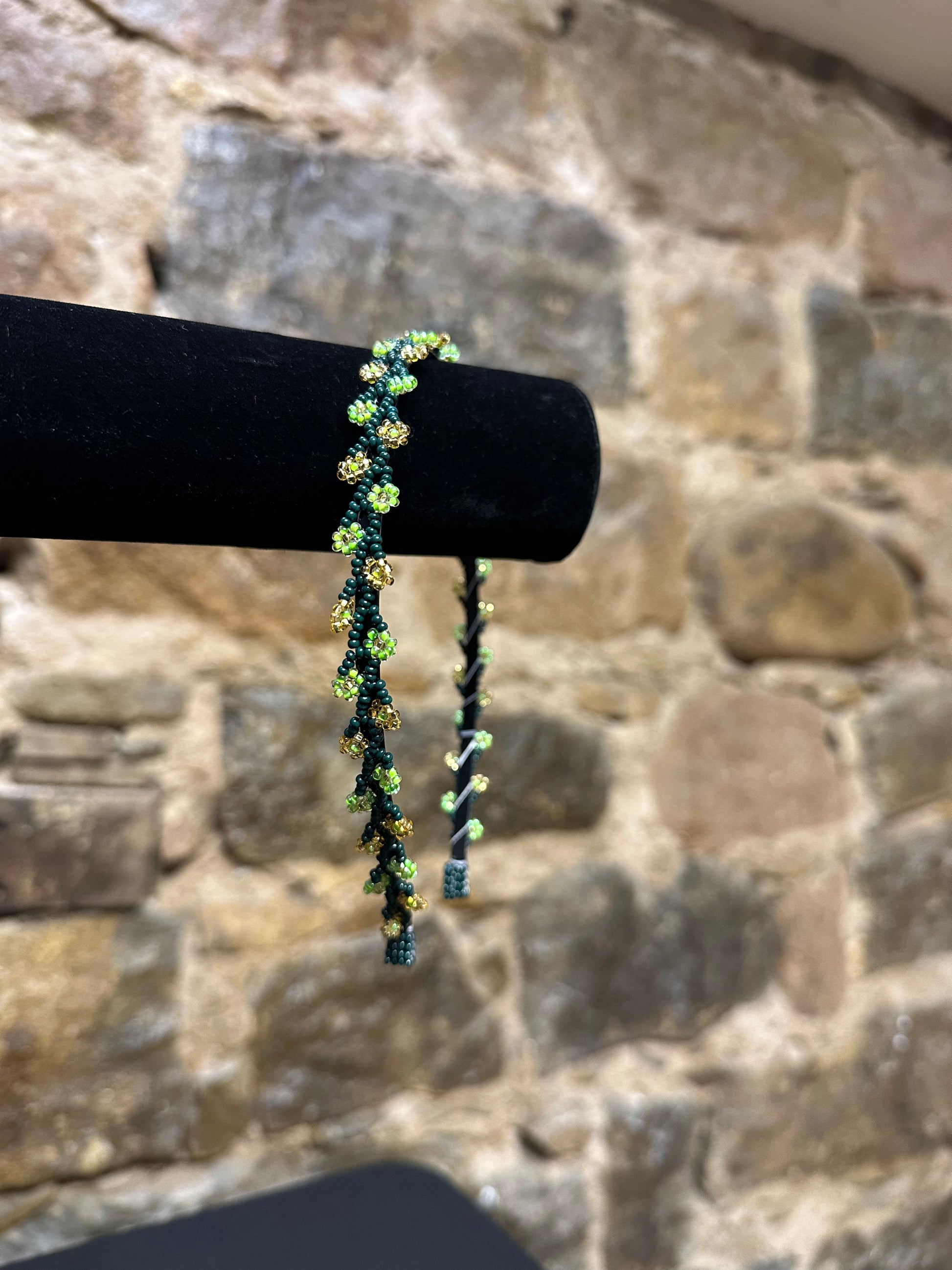 Add a burst of color to your Child's day with these cheerful floral design beaded headbands! All of these headbands are hand made with colorful beads and intricate detail, making them a perfect addition to your child's wardrobe. Ideal for children ages 5 and up, these beaded headbands will become your child's favorite accessory, adding a unique and fun flair to their look!