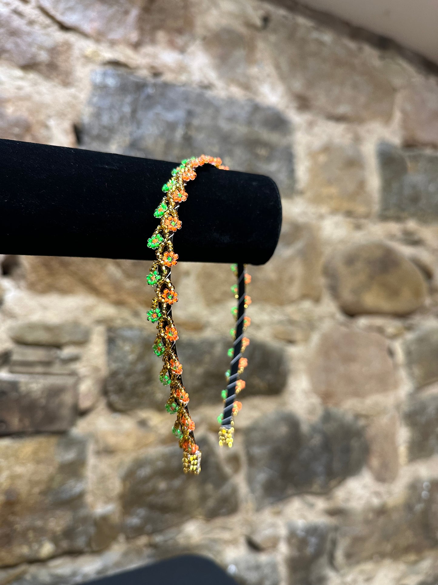 Add a burst of color to your Child's day with these cheerful floral design beaded headbands! All of these headbands are hand made with colorful beads and intricate detail, making them a perfect addition to your child's wardrobe. Ideal for children ages 5 and up, these beaded headbands will become your child's favorite accessory, adding a unique and fun flair to their look!