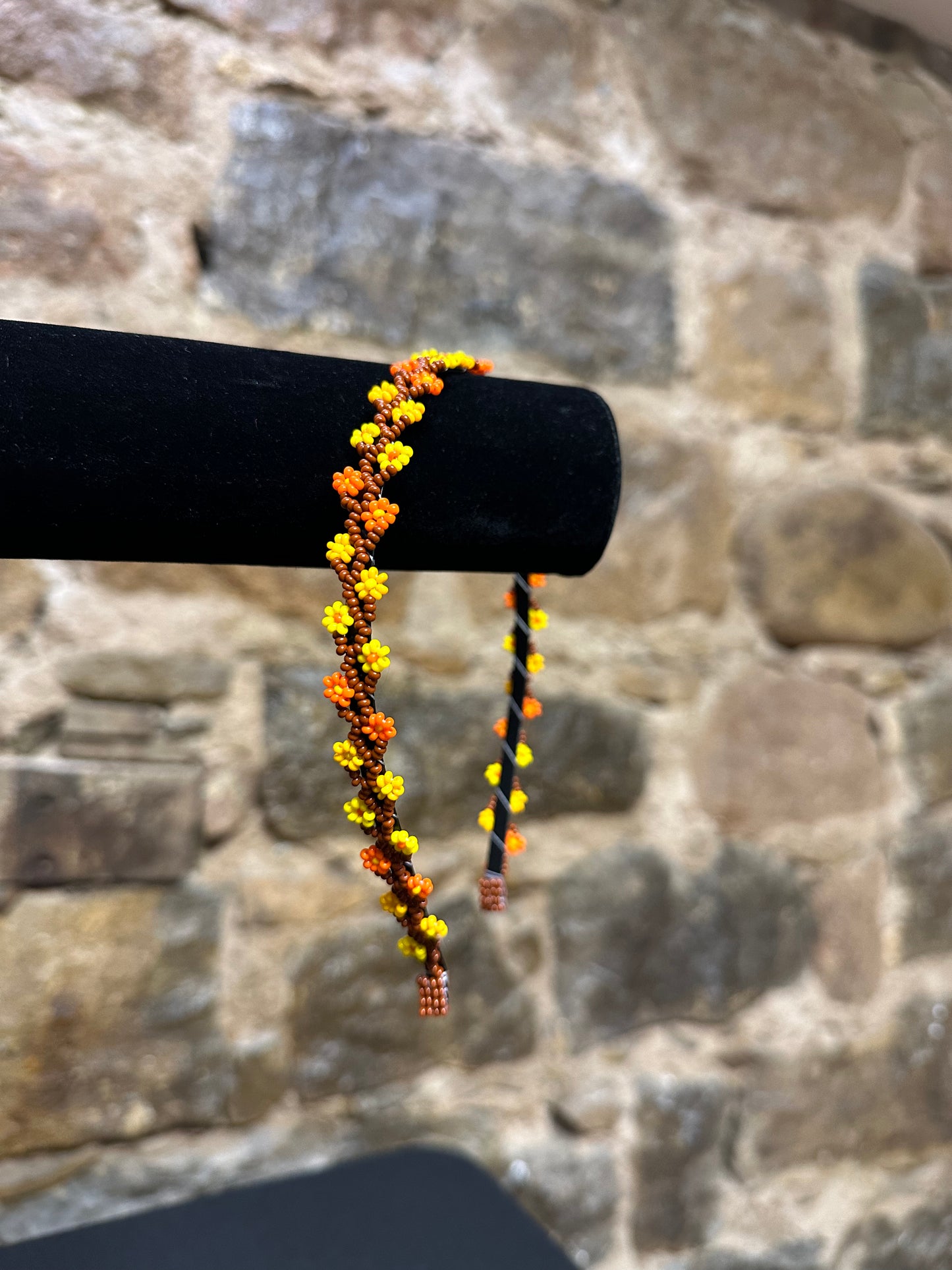 Add a burst of color to your Child's day with these cheerful floral design beaded headbands! All of these headbands are hand made with colorful beads and intricate detail, making them a perfect addition to your child's wardrobe. Ideal for children ages 5 and up, these beaded headbands will become your child's favorite accessory, adding a unique and fun flair to their look!