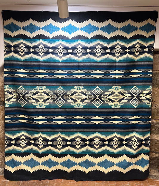 Kick back and cozy up with a blanket softer than anything you’ve ever experienced before. This vibrant, unique piece adds envy-worthy style to any room, while also being tough enough to withstand the wear and tear of constant use. Handmade by artisans in Ecuador. Reversible Color.