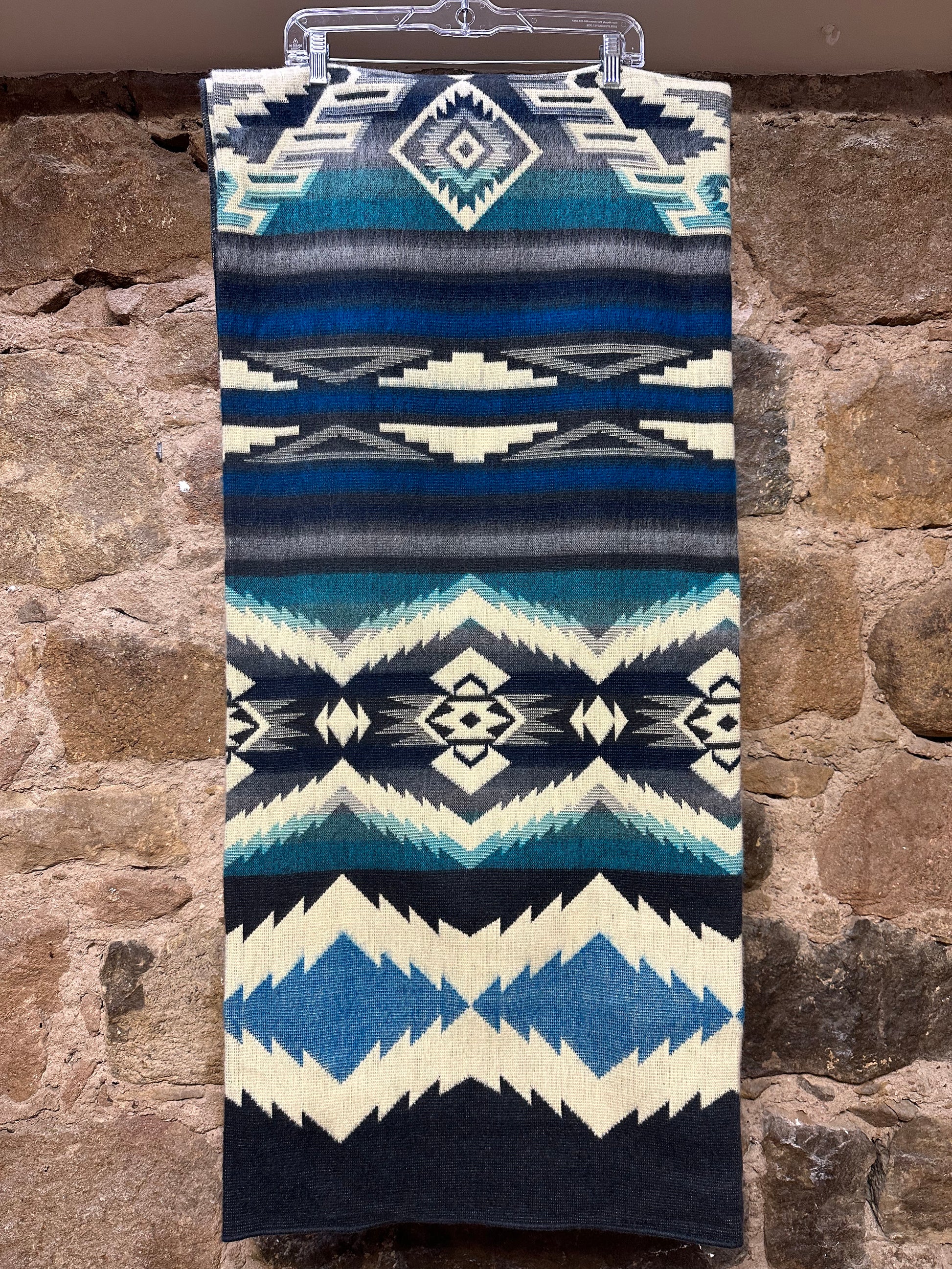 Kick back and cozy up with a blanket softer than anything you’ve ever experienced before. This vibrant, unique piece adds envy-worthy style to any room, while also being tough enough to withstand the wear and tear of constant use. Handmade by artisans in Ecuador. Reversible Color.