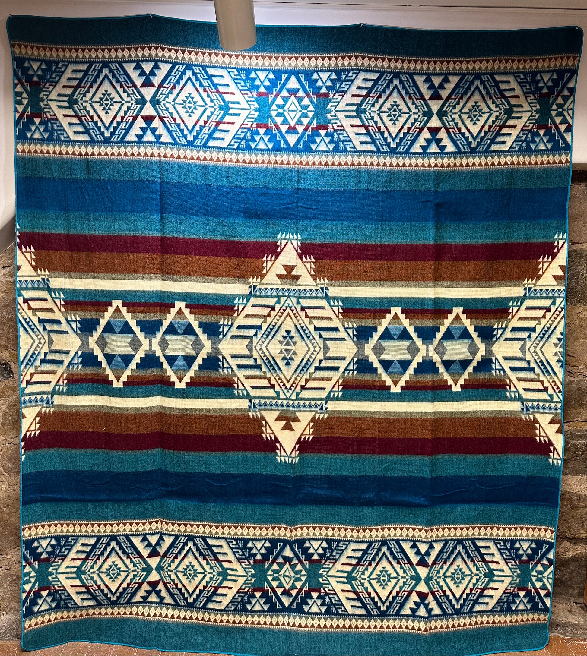 Kick back and cozy up with a blanket softer than anything you’ve ever experienced before. This vibrant, unique piece adds envy-worthy style to any room, while also being tough enough to withstand the wear and tear of constant use. Handmade by artisans in Ecuador. Reversible Color.