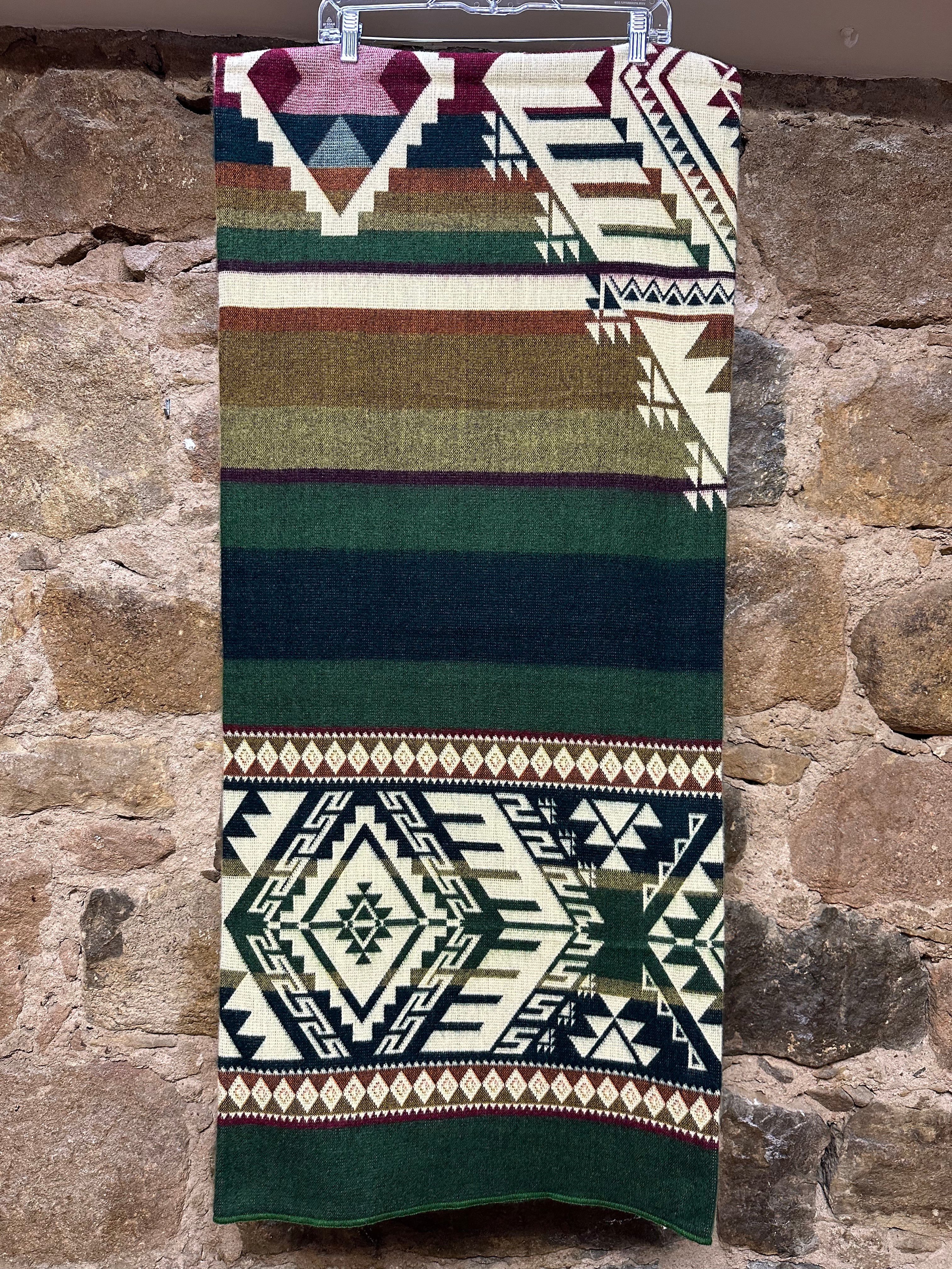 Kick back and cozy up with a blanket softer than anything you’ve ever experienced before. This vibrant, unique piece adds envy-worthy style to any room, while also being tough enough to withstand the wear and tear of constant use. Handmade by artisans in Ecuador. Reversible Color.